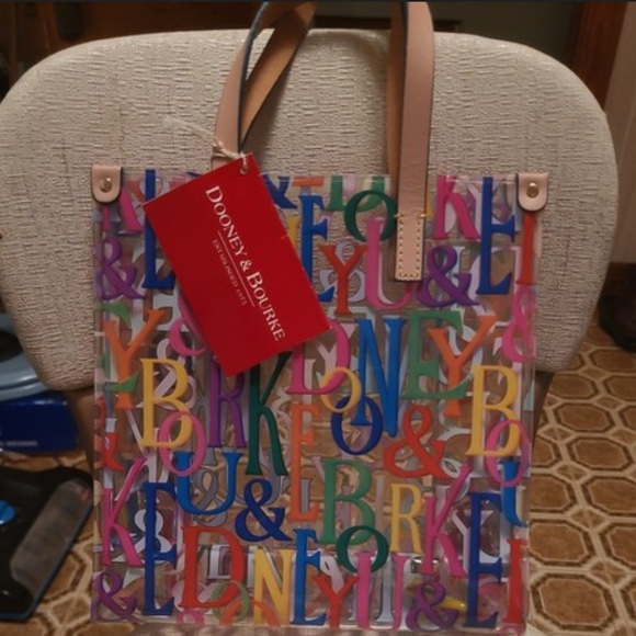 Dooney & Bourke Handbags - Vintage Dooney & Bourke Clear tote bag (Brand new with tags)